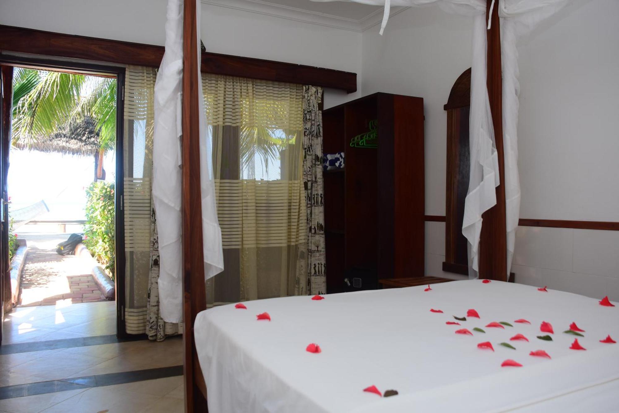 มานารานิ บีช คอตเทจเจส Hotel นูงวี ภายนอก รูปภาพ